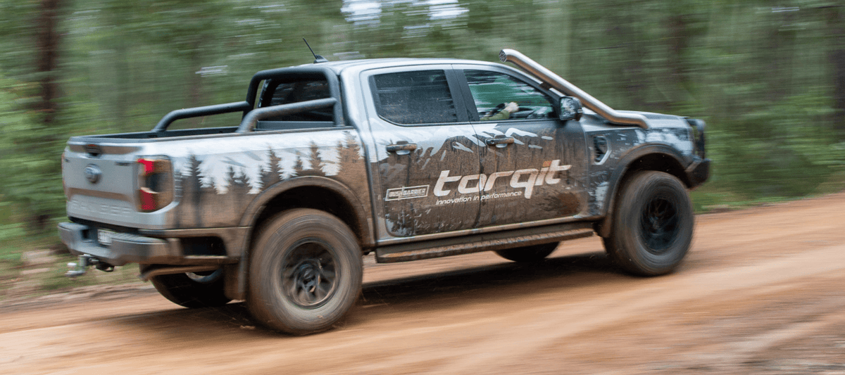 Next Gen Ranger with stainless snorkel driving through bush track